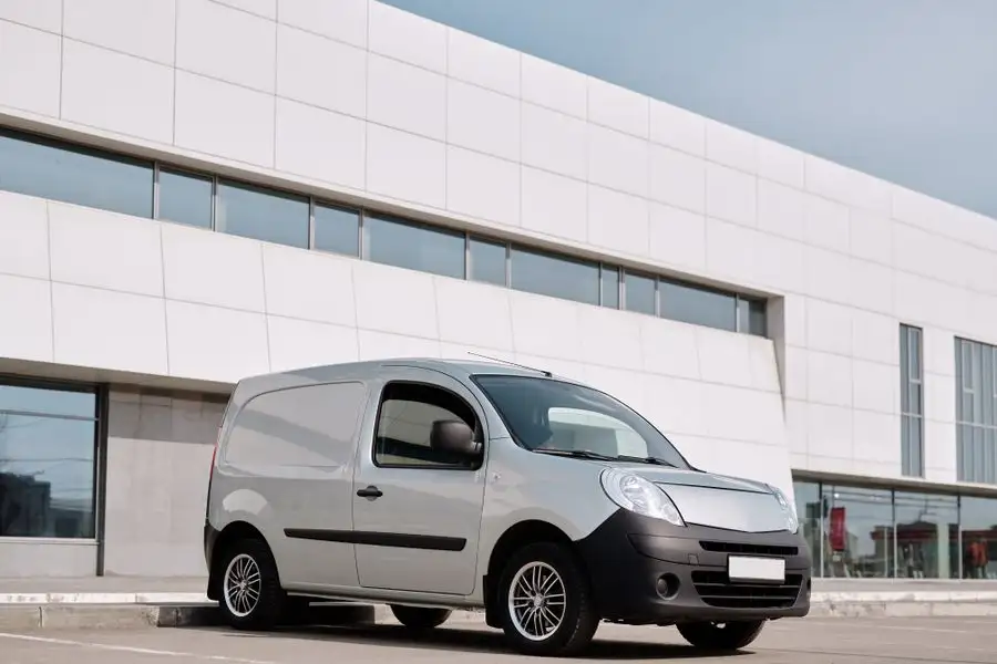 Delivery van being loaded with ecommerce parcels at a Dubai warehouse